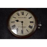 A large early 19th century mahogany cased C.W Holmes wall mounted station/municipal building clock,