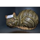 A Tremar stoneware money box in the shape of a cat.