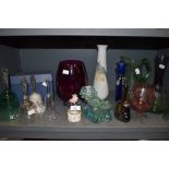A variety of glass including an unusual candlestick holder, colourful pieces and bells.