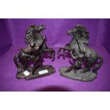 A pair of bronzed spelter figures, Horse and charioteer in Marley style after Coustou.
