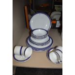 A selection of Royal porcelaine plates and cups and saucers,having blue band with gilt edging.