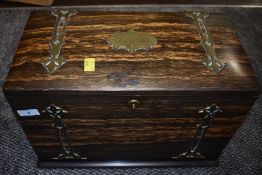 A late 19th century Coromandel correspondence/writing box lined in golden oak, having segmental