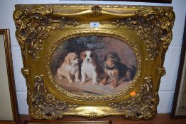 A print on board of thee pups,in reproduction gilt frame.