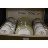 A boxed set of Royal Doulton 'Sonnet' cups and saucers.