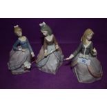Three Lladro figurines, Girl with Parasol and similar missing parasols including impressed number