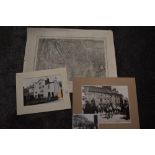 A vintage map of Kendal and mounted photographs, possibly of local interest.