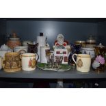 A large lot of ceramics, including Dudson, Carlton ware and various tea pots, commemorative mugs and