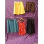 Five vintage 1960s and 70s skirts,some mini skirts and others fitted or full circle. mixed sizes,