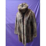 A vintage mink jacket with matching hat,around 1960s in a shorter length and in soft and supple
