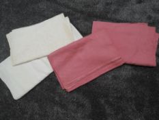 A collection of victorian linen sheets, two in rose pink and two white, a little age staining in