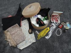 A hat box containing a varied lot of vintage bits and pieces, including costume jewellery, beads and