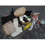 A hat box containing a varied lot of vintage bits and pieces, including costume jewellery, beads and