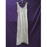 A 1920s full length champagne velvet dress, very good condition for its age, with only minor