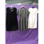 Three 1950s shift dresses in larger sizes, including Black velvet with bow detail, all very well