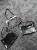Three vintage 1950s and 60s black clasp fastening handbags, good condition.