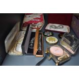 A mixed lot of vintage compacts including Stratton, costume jewellery and a manicure set. Also