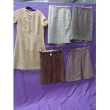 Four vintage 1950s and 1960s wool skirts and a dress, including Harris Tweed,all good condition,