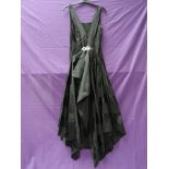 A black 1940s black striped gown(possibly a silk or synthetic silk blend) having handkerchief hem,