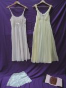 Two vintage nylon nightdresses,one Kayser double layered white and lemon,another having lace