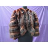 One very decadent vintage 'Bradleys' mink stole or wrap, made up of bands of mahogany toned mink(