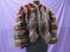 One very decadent vintage 'Bradleys' mink stole or wrap, made up of bands of mahogany toned mink(