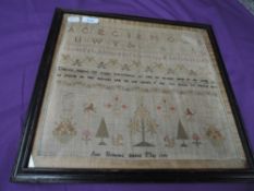 A Framed sampler with finish date of 1797, depicting Alphabet, animals and proverbs.