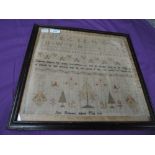 A Framed sampler with finish date of 1797, depicting Alphabet, animals and proverbs.