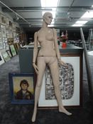 A full size female mannequin.