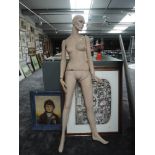 A full size female mannequin.