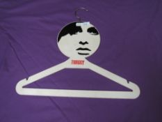 A collectable and iconic late 1960s original Twiggy coat hanger.