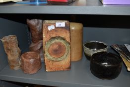 A selection of hand crafted studio pottery including Troika style and three pieces signed JM