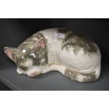A ceramic figure of a tabby cat possibly by Cappo De Monte signed Italy to base (chips to ears)