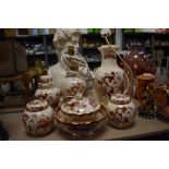 Two Masons 'Mandalay red' lamp bases, two ginger jars, lidded urn, fruit bowl and dish with lid.