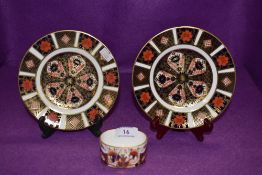 Two plates and small trinket dish by Royal Crown Derby