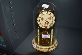 A domed anniversary clock by Kundo