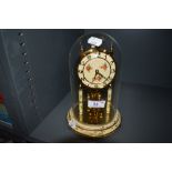 A domed anniversary clock by Kundo