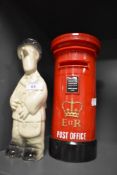 A ceramic Postman Pat figure and accompanying Post box