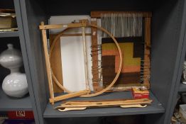 A weavers loom and similar wool working tools
