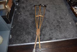 A pair of vintage medical crutches