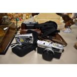 A selection of photographic equipment and cameras including Olymups 35