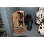 A scientific microscope and set of Halina binoculars 12x50 and a pair of Carl Zeiss teleater 6x