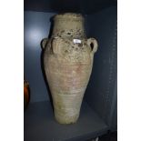 A cast greek style urn garden decoration