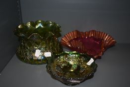 A selection of fine glass wares including Loetz iridescenct green bowl, similar bowl and cranberry