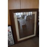 An antique large size pine and wood mounted frame