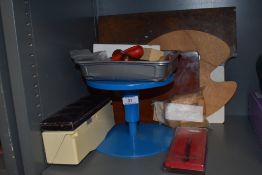 A selection of artist ceramist and potters tools including wheel and palettes