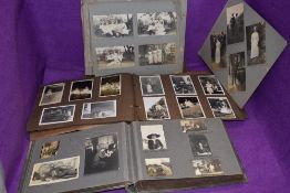 A selection of early and vintage photographs including portraits transport and similar