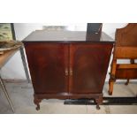 A period style mahogany TV cabinet on cabriole legs, approx width 82cm