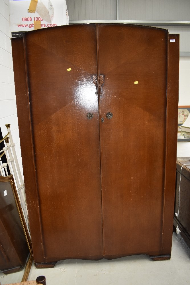 A mid 20th Century oak and ply wardrobe