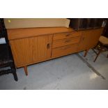 A vintage teak effect laminate sideboard, width approx. 152cm