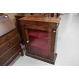 A 19th Century Empire style low display cabinet, having line inlay decoration, with plush lined